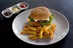 Burger And Fries With Ketchup Stock Photo