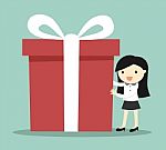 Business Concept, Business Woman Holding A Big Gift Box For Christmas Festival Stock Photo