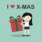 Business Concept, Business Woman Holding A Gift Box With The Words "i Love X-mas" Stock Photo