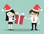 Business Concept, Business Woman Is Giving Red Gift Box To Businessman For Christmas Festival Stock Photo