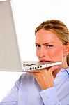 Business Lady Biting Laptop Stock Photo