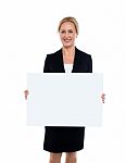 Business Lady Displaying Blank White Ad Board Stock Photo