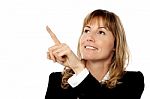 Business Lady Pointing At Something Stock Photo