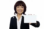 Business Lady Showing Blank Card Stock Photo