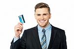 Business Man Holding A Credit Card Stock Photo