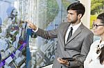 Business Man Holding A Presentation Stock Photo