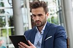 Business Man In A Cafe Stock Photo