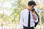 Business Man Standing On The Balcony Stock Photo