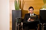 Business Man Waiting In Lobby Stock Photo