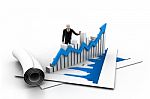 Business Man With Growth Graph Stock Photo