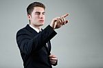 Business Man With Pointing To Something Or Touching A Screen Stock Photo