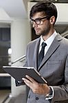 Business Man With Tablet Stock Photo