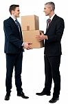 Business Men Posing With Cardboard Boxes Stock Photo