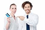 Business People Showing Credit Card Stock Photo