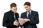 Business People Using A Digital Tablet Stock Photo