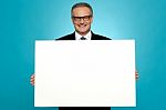 Business Representative Holding Blank Ad Board Stock Photo