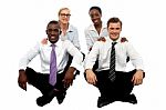 Business Team Sitting On Floor Stock Photo