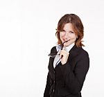 Business Woman Holding Glasses In Mouth Stock Photo