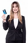 Business Woman Holding Up Her Cash Card Stock Photo