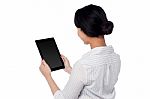 Business Woman Operating Touch Pad Device Stock Photo