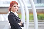 Business Woman Smiling Arms Crossed Stock Photo