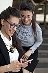 Business Women Chatting On A Break Stock Photo