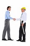 Businessman And Architect Shaking Hands Stock Photo