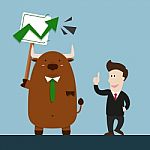 Businessman And Cute Big Brown Bull In Stock Market Going Up Stock Photo