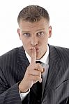 Businessman Asking To Keep Silent Stock Photo