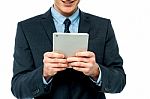 Businessman Browsing On Tablet Pc Stock Photo