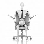 Businessman Doll Sitting On Chair Stock Photo