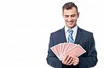 Businessman Gambling His Luck Stock Photo