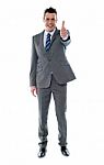 Businessman Gesturing Thumbs Up Stock Photo