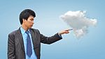 Businessman Hand Pushing A Cloud Stock Photo