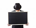 Businessman Holding A Blackboard Stock Photo