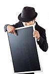 Businessman Holding A Blackboard Stock Photo