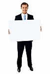 Businessman Holding Blank Board Stock Photo