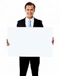 Businessman Holding Blank Board Stock Photo