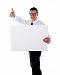 Businessman Holding Blank Board Stock Photo