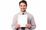 Businessman Holding Blank Paper Stock Photo