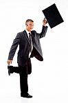 Businessman Holding Briefcase Stock Photo