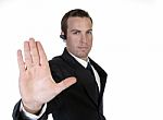 Businessman Holding Hand Out In Protest Stock Photo