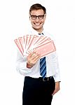 Businessman Holding Playing Cards Stock Photo