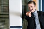 Businessman In Suit Pointing Finger Stock Photo