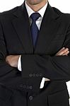 Businessman In Suit With Crossed Hand Stock Photo