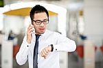 Businessman Look His Watch Stock Photo