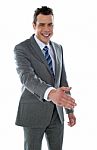 Businessman Offering Handshake Stock Photo