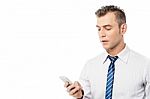 Businessman Operating His Mobile Phone Stock Photo