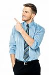 Businessman Pointing At Something Stock Photo
