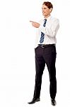 Businessman Pointing Away Stock Photo